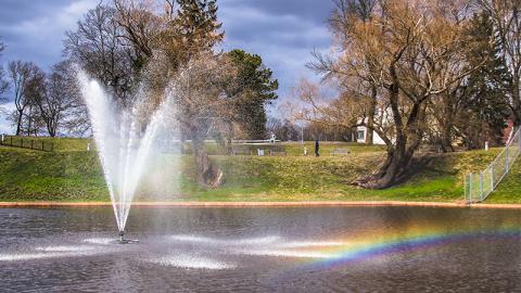 Fountain in the Pärnu River creating a rainbow