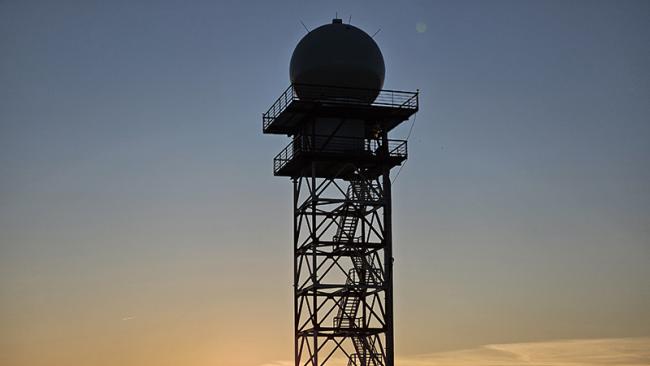 Weather radar with sunset in the background