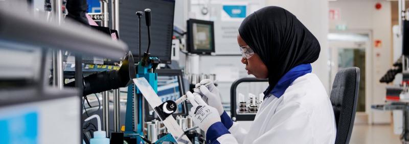 Employee at work in Vaisala instrument factory